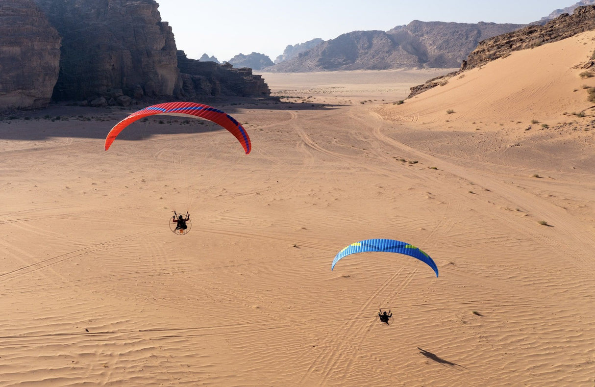 two paramotors in the desert